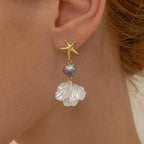 Gold starfish and white shell petal drop earrings with rainbow scalloped bead