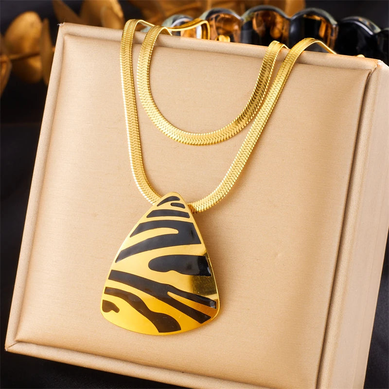 Tiger stripe teardrop pendant necklace with matching earrings, gold-tone chain