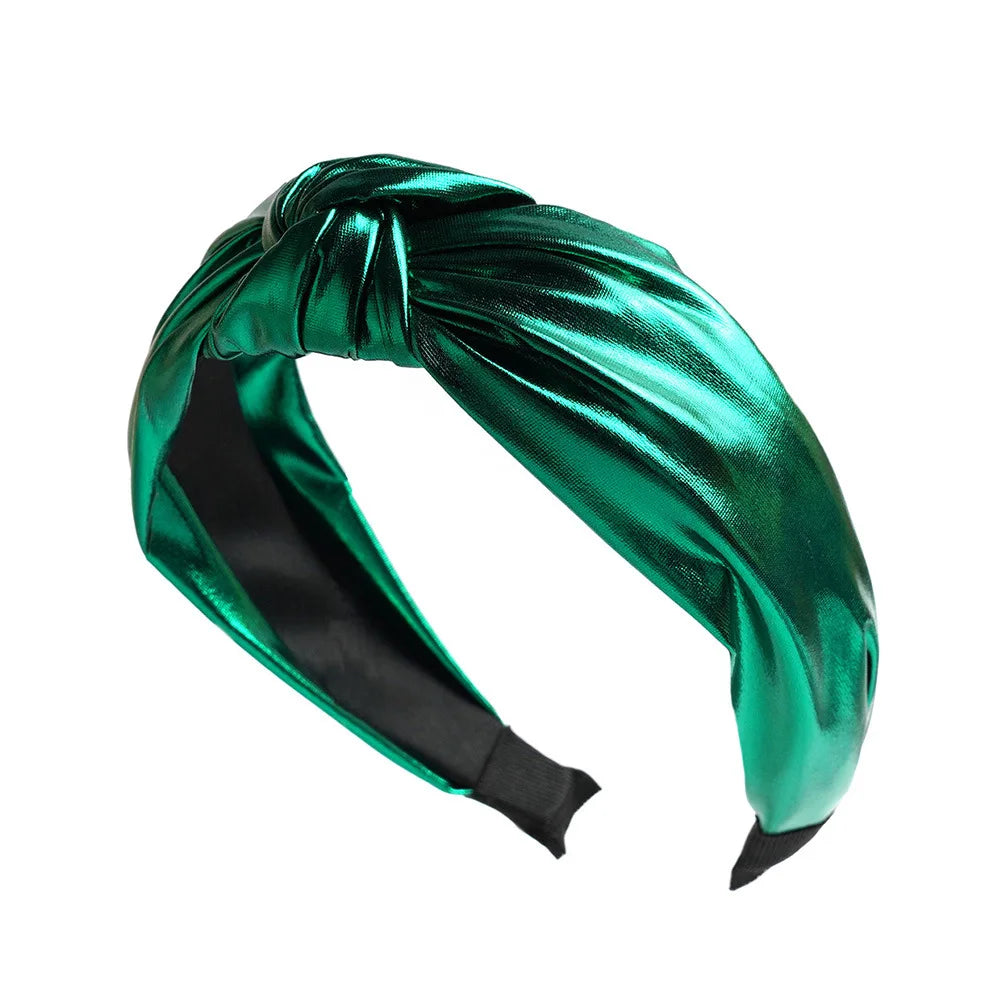 Wide PU leather headband in green metallic with twisted knot top and elastic ends