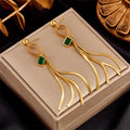 Green zircon drop earrings with square green stones and gold-tone tassel fringe
