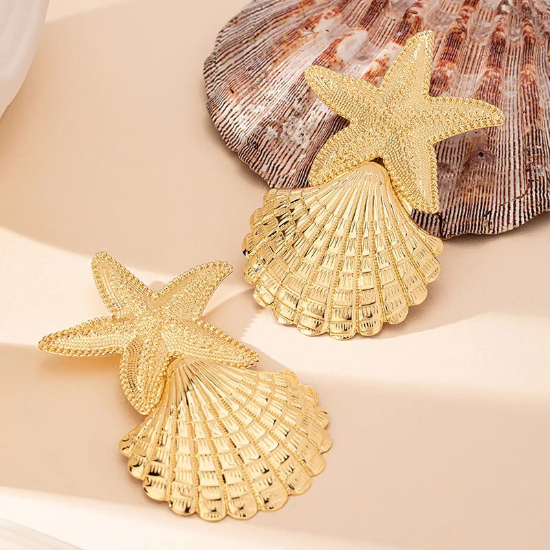 Gold starfish and scallop-shell drop earrings, beaded star top and fan base