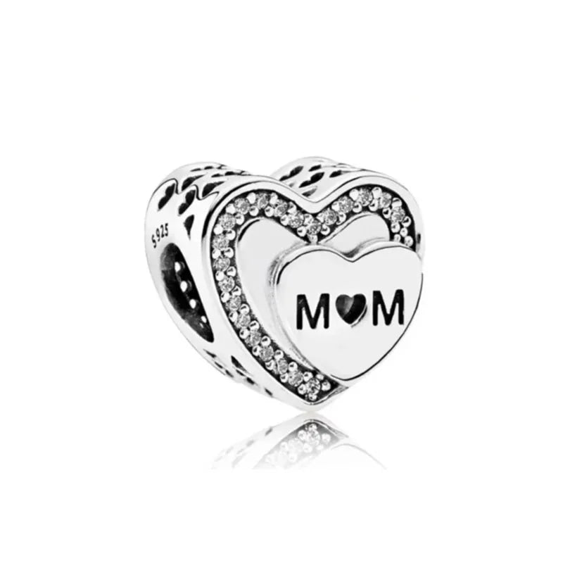 Sterling silver heart charm bead with “MOM” text and sparkling crystal trim