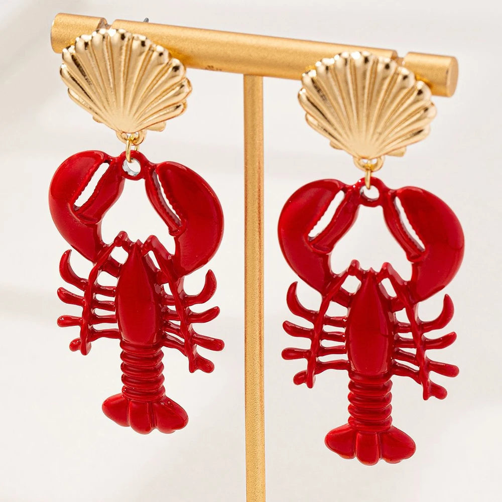 Gold-tone lobster dangle earrings with red lobster charms and scallop shell stud tops