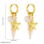 Gold hoop starfish and conch pearl drop earrings, front view