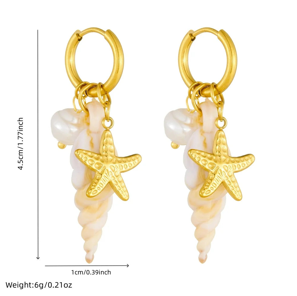 Gold hoop starfish and conch pearl drop earrings, front view