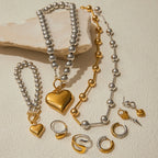 Ball-bead heart jewelry set with necklace, earrings, rings, and bracelets in gold and silver