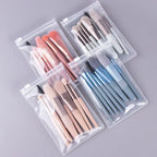 Makeup brush set in clear cases, assorted handle colors with soft bristles