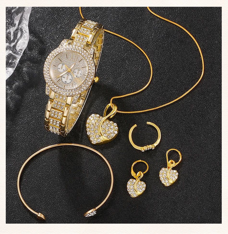 Gold watch with rhinestone bracelet; heart pendant, hoop earrings, bangles, and rings