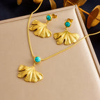 Gold-tone set in box: turquoise pendant necklace with matching ginkgo leaf earrings