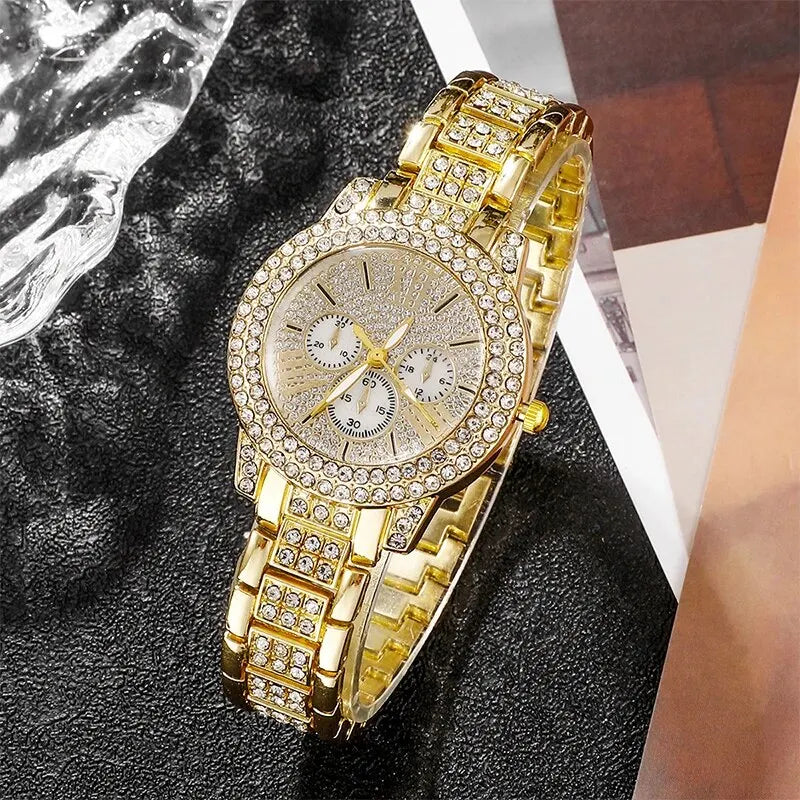 Gold rhinestone wrist watch with multi-dial face and segmented jeweled metal bracelet