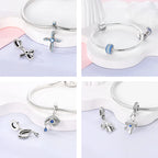 925 sterling silver charm bracelet with blue enamel evil eye and hand-shaped charms