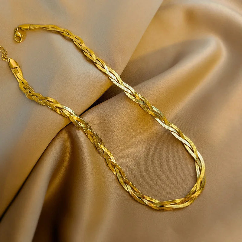 Gold snake-chain necklace and bracelet set, twisted oval links with clasp hardware