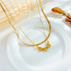 Gold double-layer heart necklace with blue and pink enamel heart pendants