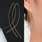 Boucles d'oreilles pendantes bohème à pompons — Étoile de mer et coquillage