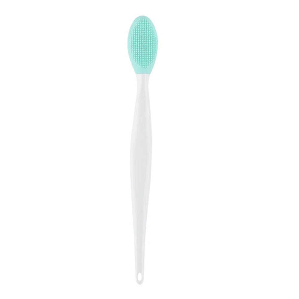 Silicone face cleansing brush with mint green oval head and white handle