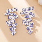 Geometric irregular stud earrings, blue floral zigzag pair