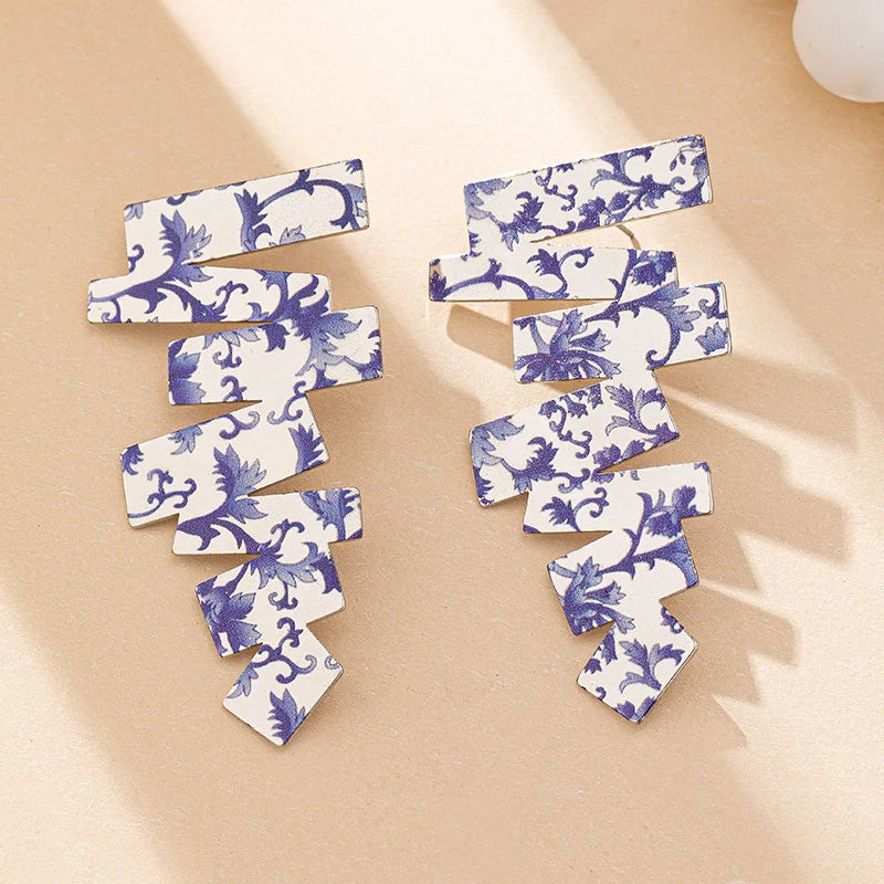 Geometric irregular stud earrings, blue floral zigzag pair