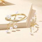 Gold-tone pearl bracelet and ring set with white bead drops on display box