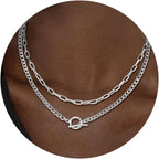 Silver layered chain necklace with oval connector and two stacked chain links