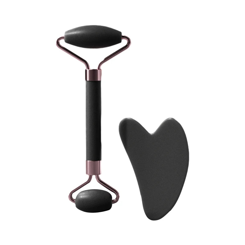 Facial massage roller set with black heart-shaped scraper and rounded base roller