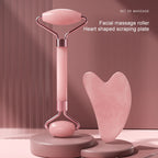 Facial massage roller set with heart-shaped scraping plate and pink dual rollers on handle