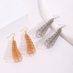 Wire drop earrings in orange and silver, looped teardrop strands