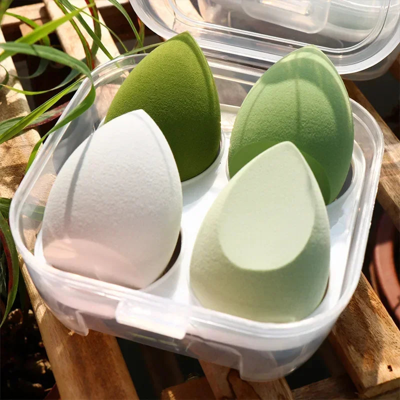 4-piece makeup sponge set in clear box with green and white teardrop sponges