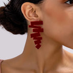 Geometric irregular stud earrings, dark red zigzag shapes