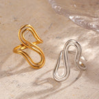 Gold and silver geometric open stacking rings, curved ribbed open bands shown