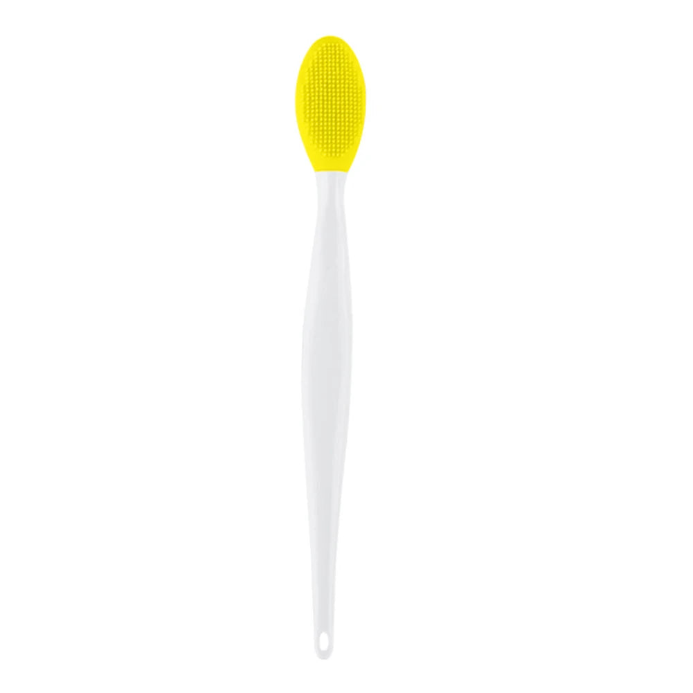 Silicone face cleansing brush with yellow oval head and white handle