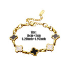 Four-leaf clover charm bracelet with gold-tone chain and alternating white and dark clover charms