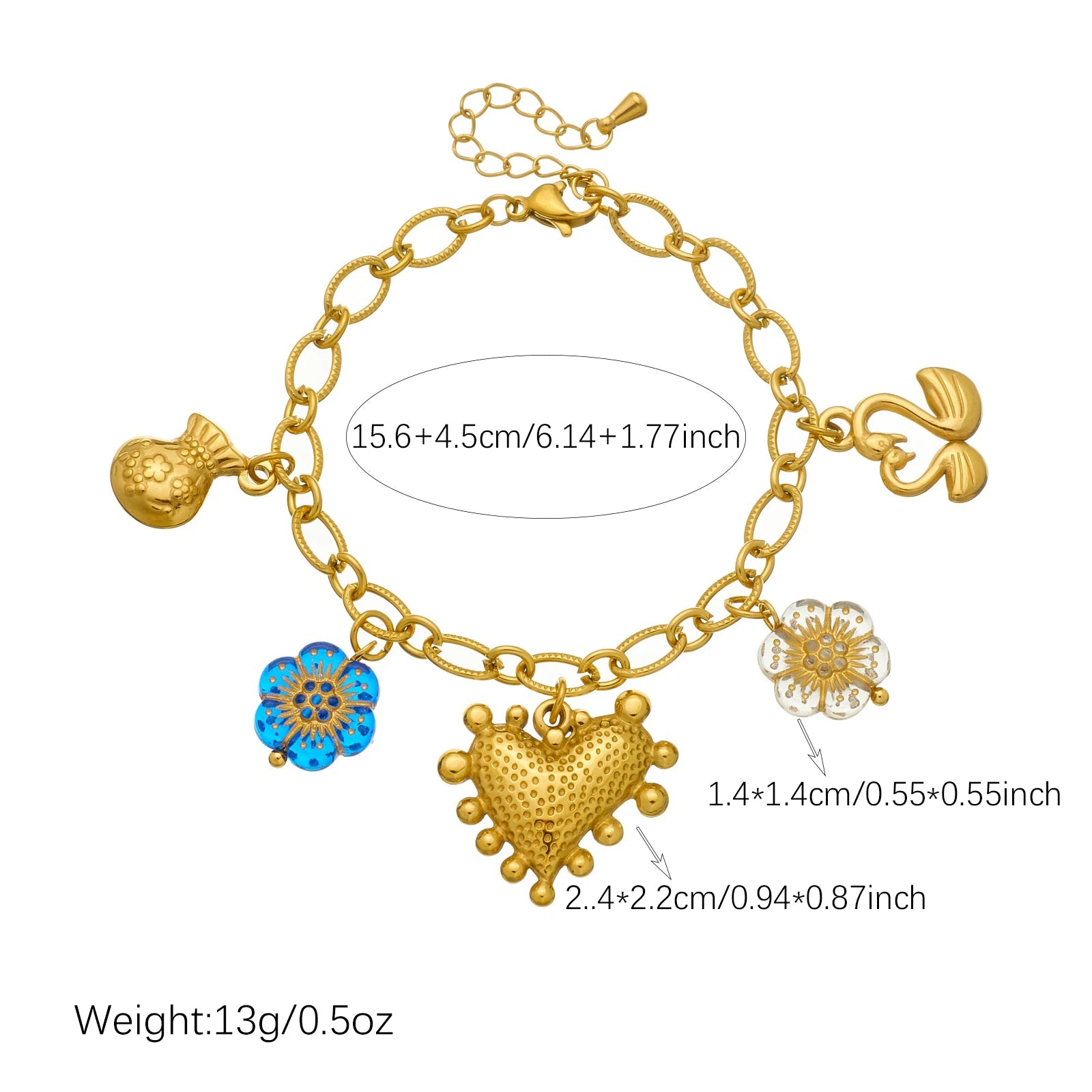 Gold-tone charm necklace featuring heart, blue flower, and round pendant with small tassel
