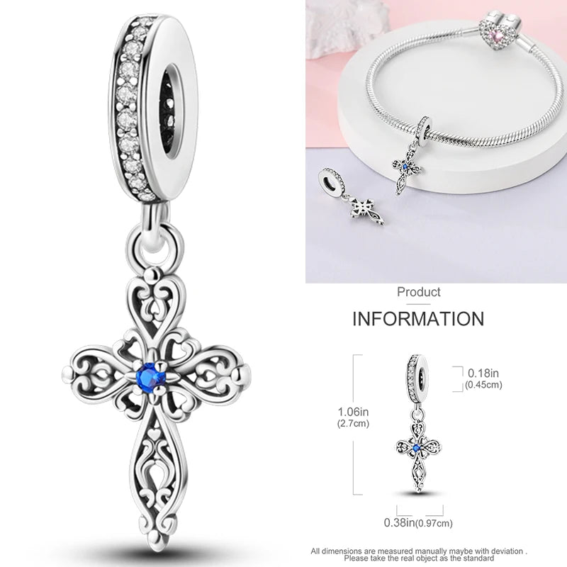925 sterling silver charm bead with blue jeweled cross and filigree design
