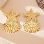 Gold starfish and shell drop earrings, fan-like shell tiers with beaded star detail