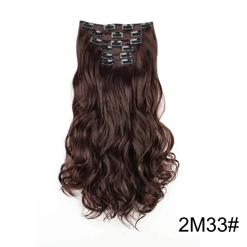 Deep brown curly clip-in hair extension with metal comb clips at the top