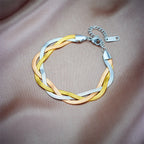 Two-tone snake chain necklace and bracelet set with silver and gold links, toggle clasp