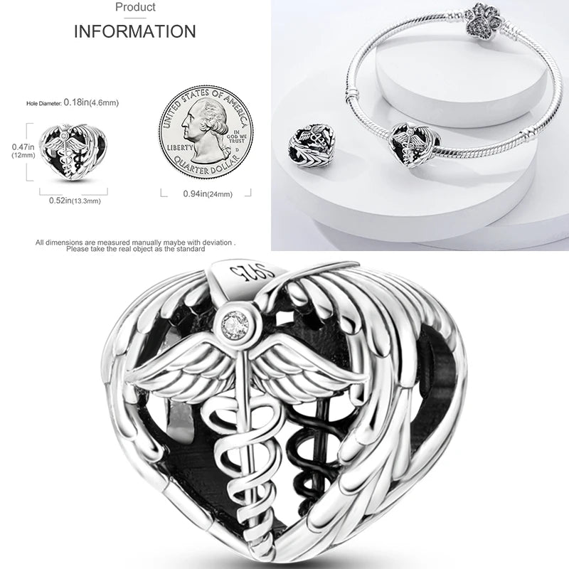 Sterling silver heart charm with angel wings and center caduceus symbol