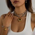 Layered ball-bead heart necklace with gold heart pendant and matching ring and bracelet