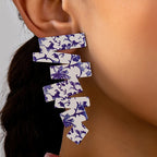 Geometric irregular stud earrings, blue floral zigzag shapes