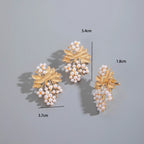 Pearl and gold-tone leaf cluster drop earrings, three-piece display