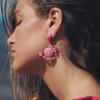 Crab enamel earrings with red-and-white dotted crab and pink claws on gold hooks