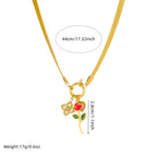 Gold-tone snake chain necklace with rose flower and red heart pendant