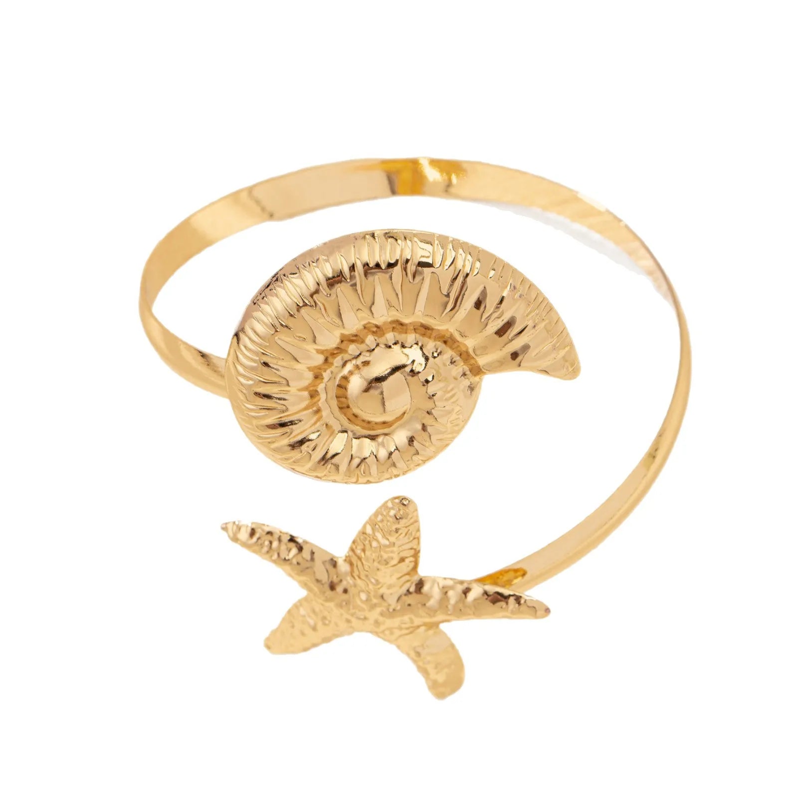 Gold-toned open cuff arm ring with textured shell disk and starfish charm below