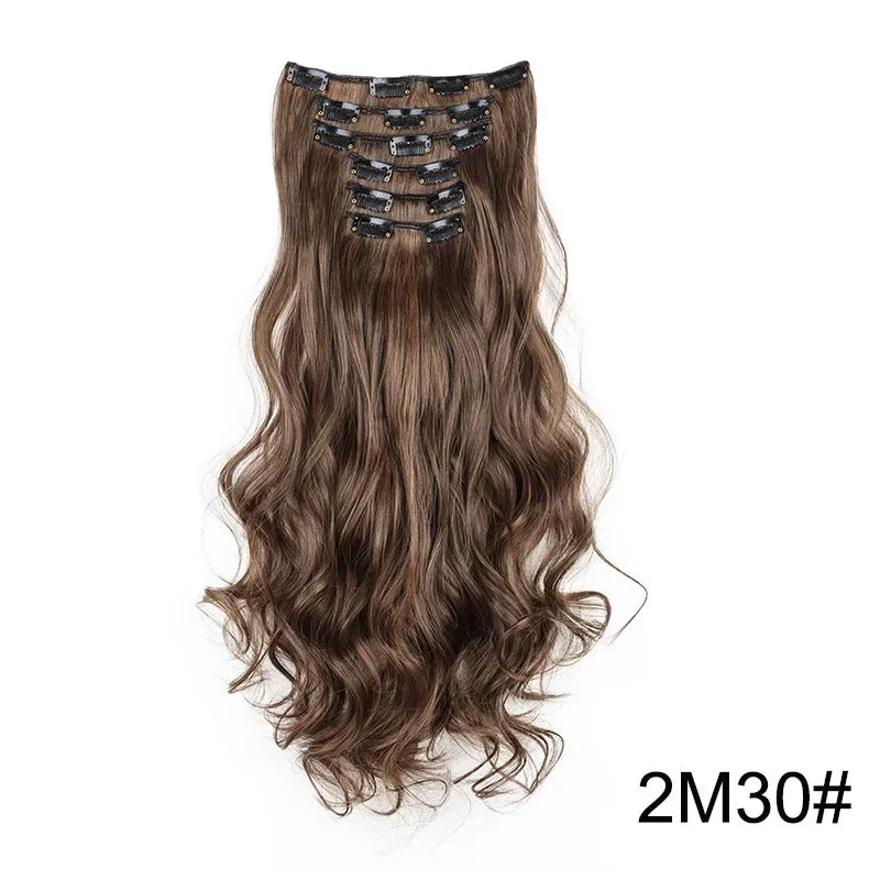 Medium brown wavy clip-in hair extension with metal comb clips at the top