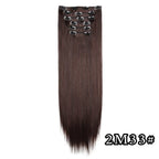Dark brown straight clip-in hair extension with metal comb clips at the top