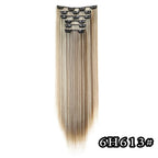 Platinum blonde straight clip-in hair extension with metal comb clips at the top