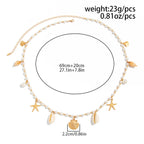 Pearl belly chain with shell and starfish charms, gold-tone beaded strand
