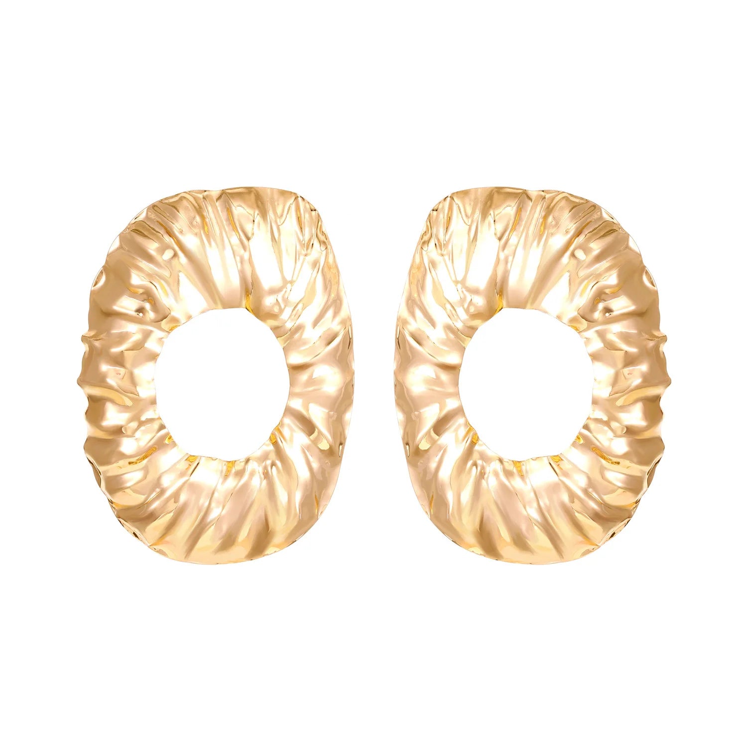 Textured gold oval stud earrings with ridged hammered pattern and hollow center