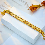 Gold-tone thick chain bracelet with flat rectangular bar links