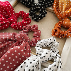 Polka-dot chiffon scrunchie scarves in red, black, pink, and white